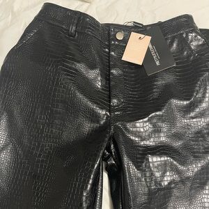 Pretty little thing black pants .